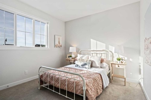 86 Cimarron Estates Drive, Okotoks, AB - Indoor Photo Showing Bedroom