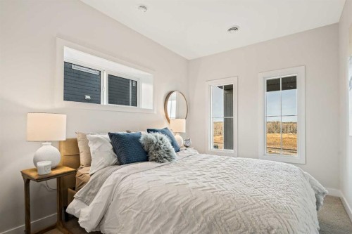 86 Cimarron Estates Drive, Okotoks, AB - Indoor Photo Showing Bedroom