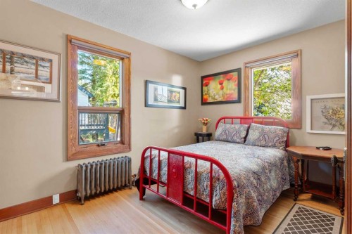 10 & 20-30061 Range Road 23, Rural Mountain View County, AB - Indoor Photo Showing Bedroom
