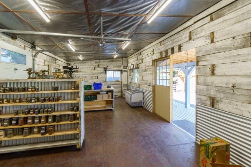 10 & 20-30061 Range Road 23, Rural Mountain View County, AB - Indoor Photo Showing Garage