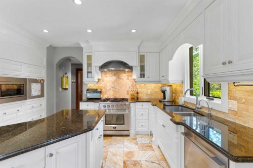 10 & 20-30061 Range Road 23, Rural Mountain View County, AB - Indoor Photo Showing Kitchen With Double Sink With Upgraded Kitchen