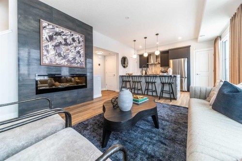 903-60 Howse Lane Ne, Calgary, AB - Indoor Photo Showing Living Room With Fireplace