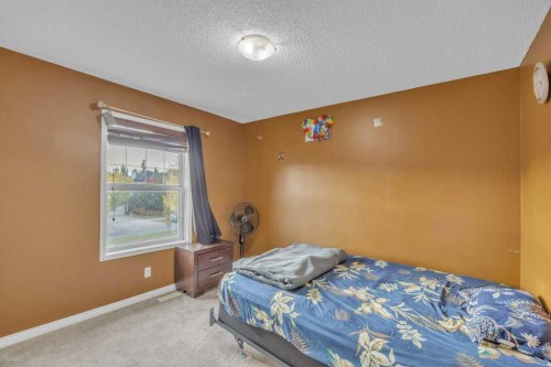 550 Copperfield Boulevard Se, Calgary, AB - Indoor Photo Showing Bedroom