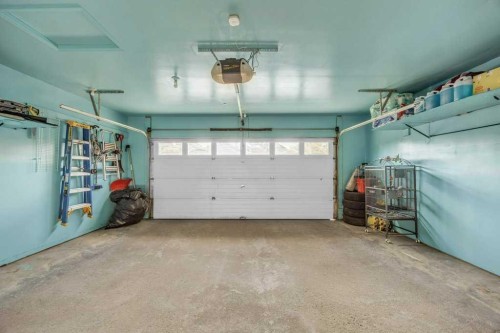 550 Copperfield Boulevard Se, Calgary, AB - Indoor Photo Showing Garage