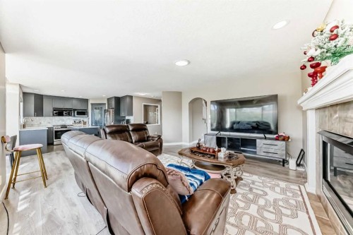 55 Edgeridge Circle Nw, Calgary, AB - Indoor Photo Showing Living Room With Fireplace