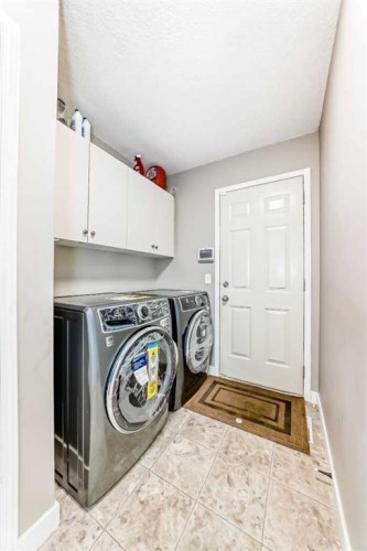 55 Edgeridge Circle Nw, Calgary, AB - Indoor Photo Showing Laundry Room