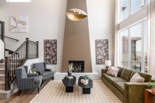 58 Starling Passage Nw, Calgary, AB - Indoor Photo Showing Living Room With Fireplace