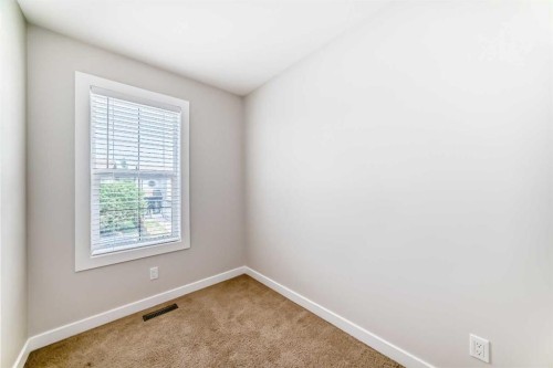210 Copperleaf Bay Se, Calgary, AB - Indoor Photo Showing Other Room