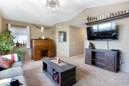 196 Brightondale Close Se, Calgary, AB - Indoor Photo Showing Living Room With Fireplace