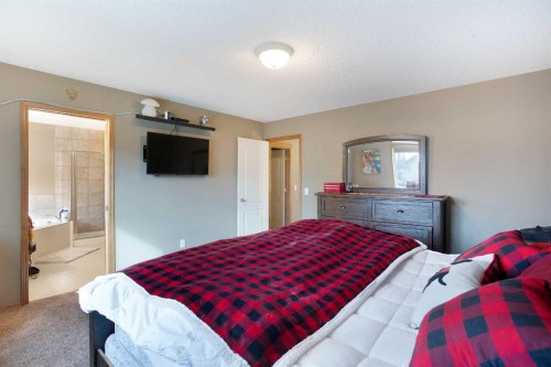 196 Brightondale Close Se, Calgary, AB - Indoor Photo Showing Bedroom