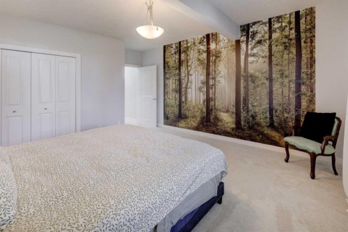 213 Kingsmere Cove Se, Airdrie, AB - Indoor Photo Showing Bedroom