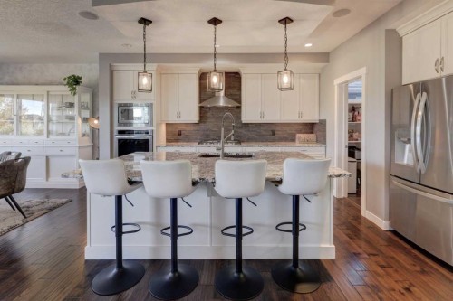 213 Kingsmere Cove Se, Airdrie, AB - Indoor Photo Showing Kitchen With Upgraded Kitchen