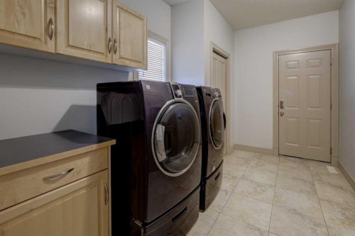 112 Cougarstone Manor Sw, Calgary, AB - Indoor Photo Showing Laundry Room