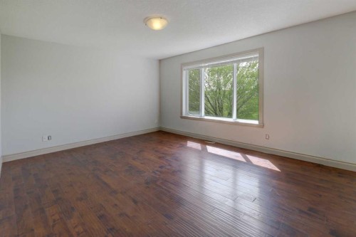112 Cougarstone Manor Sw, Calgary, AB - Indoor Photo Showing Other Room