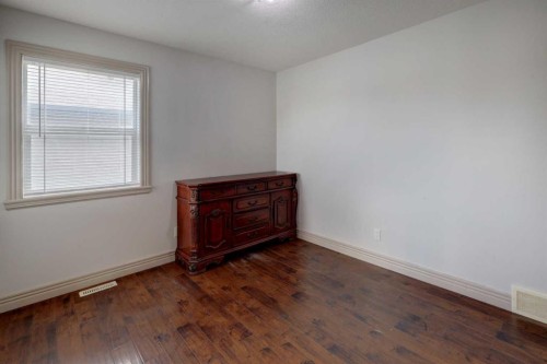 112 Cougarstone Manor Sw, Calgary, AB - Indoor Photo Showing Other Room