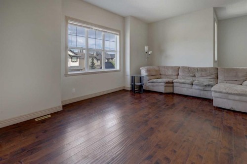 112 Cougarstone Manor Sw, Calgary, AB - Indoor Photo Showing Living Room