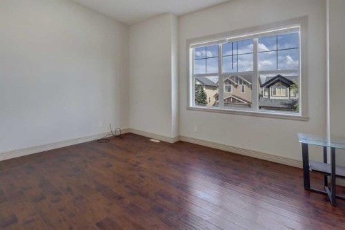 112 Cougarstone Manor Sw, Calgary, AB - Indoor Photo Showing Other Room