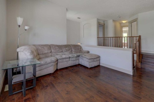 112 Cougarstone Manor Sw, Calgary, AB - Indoor Photo Showing Living Room
