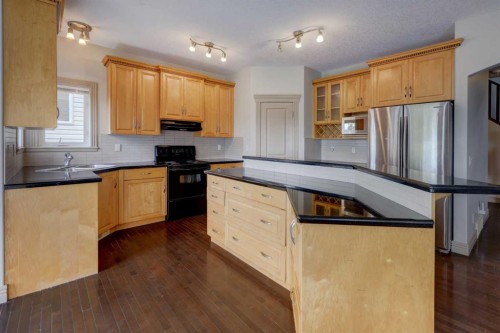 112 Cougarstone Manor Sw, Calgary, AB - Indoor Photo Showing Kitchen With Stainless Steel Kitchen