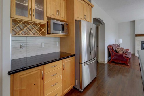 112 Cougarstone Manor Sw, Calgary, AB - Indoor Photo Showing Kitchen With Stainless Steel Kitchen