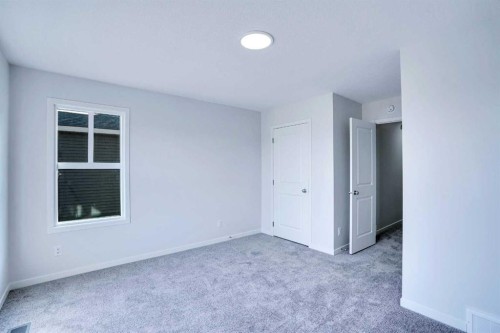 312 Edith Place Nw, Calgary, AB - Indoor Photo Showing Other Room