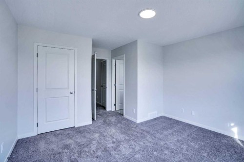 312 Edith Place Nw, Calgary, AB - Indoor Photo Showing Other Room