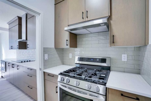 312 Edith Place Nw, Calgary, AB - Indoor Photo Showing Kitchen With Upgraded Kitchen