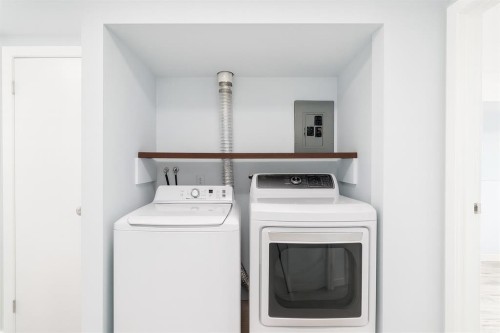 151 F Pinehill Road Ne, Calgary, AB - Indoor Photo Showing Laundry Room