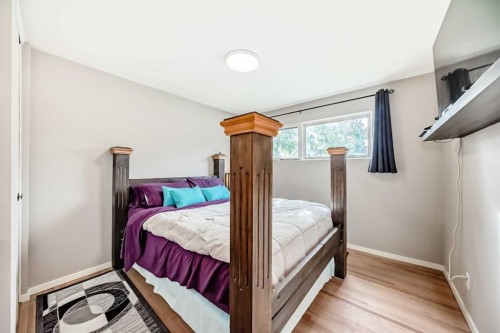 126 Springwood Drive Sw, Calgary, AB - Indoor Photo Showing Bedroom