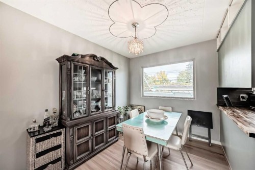 126 Springwood Drive Sw, Calgary, AB - Indoor Photo Showing Dining Room