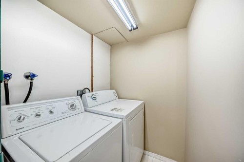 126 Springwood Drive Sw, Calgary, AB - Indoor Photo Showing Laundry Room