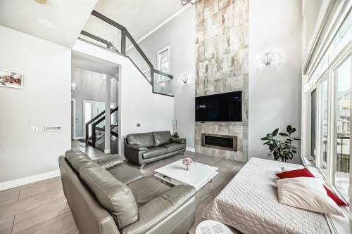 3149 Winspear Crescent Sw, Edmonton, AB - Indoor Photo Showing Living Room With Fireplace
