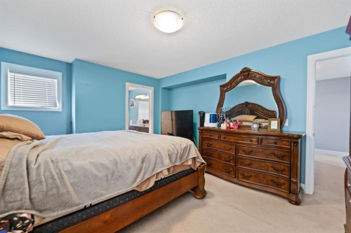 935 Windhaven Close Sw, Airdrie, AB - Indoor Photo Showing Bedroom