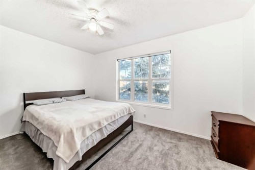 79 Hidden Crescent Nw, Calgary, AB - Indoor Photo Showing Bedroom