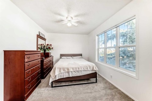 79 Hidden Crescent Nw, Calgary, AB - Indoor Photo Showing Bedroom