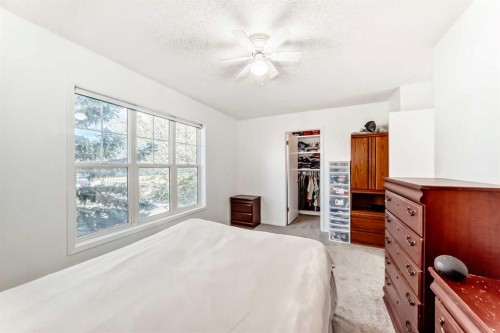 79 Hidden Crescent Nw, Calgary, AB - Indoor Photo Showing Bedroom