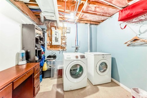 79 Hidden Crescent Nw, Calgary, AB - Indoor Photo Showing Laundry Room