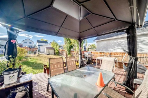 79 Hidden Crescent Nw, Calgary, AB - Outdoor With Deck Patio Veranda With Exterior