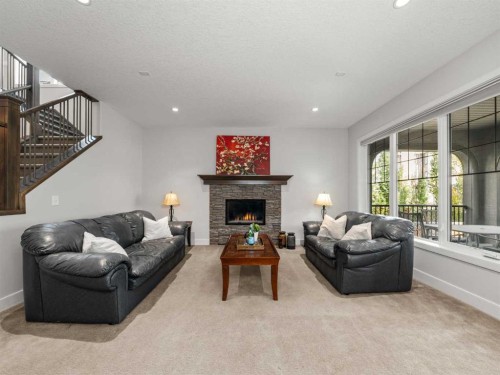 95 Mahogany Manor Se, Calgary, AB - Indoor Photo Showing Living Room With Fireplace