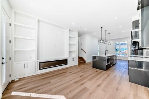 2371 20 Avenue Nw, Calgary, AB - Indoor With Fireplace