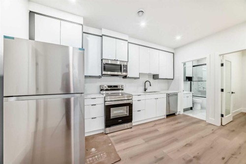2371 20 Avenue Nw, Calgary, AB - Indoor Photo Showing Kitchen With Stainless Steel Kitchen With Upgraded Kitchen