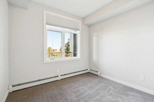 5106-200 Seton Circle Se, Calgary, AB - Indoor Photo Showing Other Room