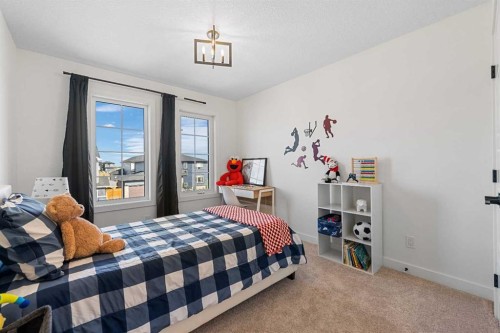 159 Brander Avenue, Langdon, AB - Indoor Photo Showing Bedroom