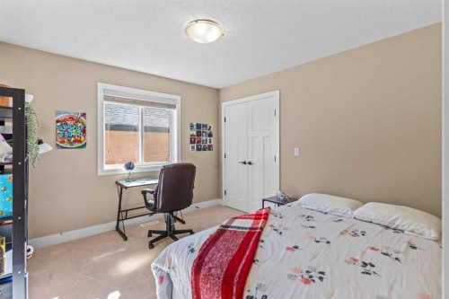1269 Sherwood Boulevard Nw, Calgary, AB - Indoor Photo Showing Bedroom
