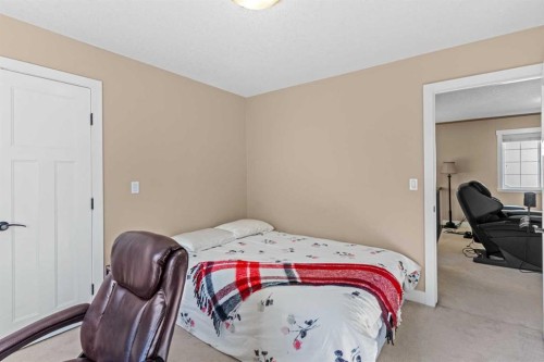 1269 Sherwood Boulevard Nw, Calgary, AB - Indoor Photo Showing Bedroom
