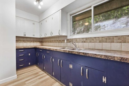 1816 42 Street Se, Calgary, AB - Indoor Photo Showing Kitchen With Double Sink