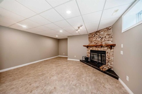 191 West Springs Close Sw, Calgary, AB - Indoor With Fireplace