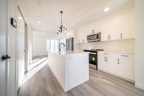 828 Arbour Lake Road Nw, Calgary, AB - Indoor Photo Showing Kitchen With Upgraded Kitchen