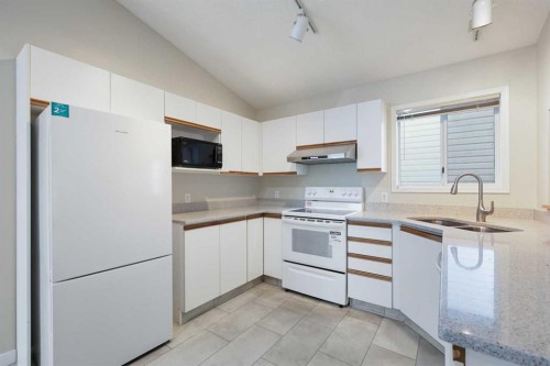57 Citadel Gardens Nw, Calgary, AB - Indoor Photo Showing Kitchen With Double Sink