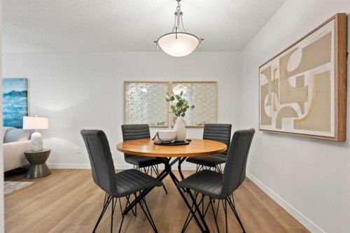 319-723 57 Avenue Sw, Calgary, AB - Indoor Photo Showing Dining Room
